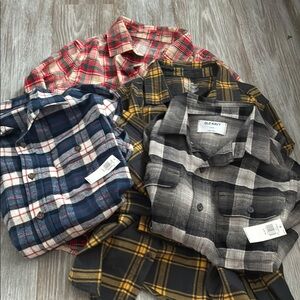 Lot of 4 youth large flannels